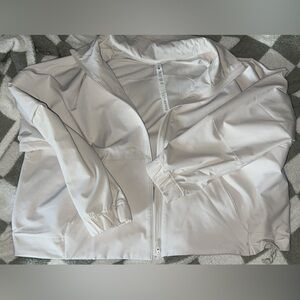 Lululemon Jacket, M/L size and never worn